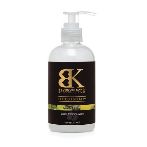 An image of Refresh and Renew gentle intimate wash in a squat bottle with a pump cap. The label reads White Tea Pear on a green strip with images of pears and leaves.